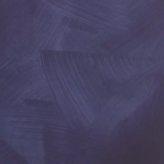 Close view of the deep violet-blue limewash, its crossing brush strokes leaving a soft, mottled movement
